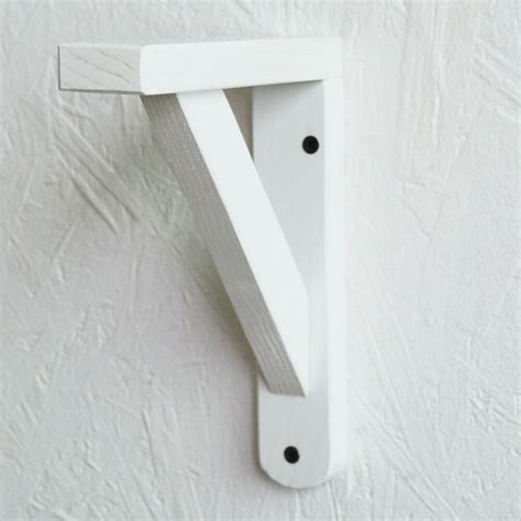 white floating shelf brackets